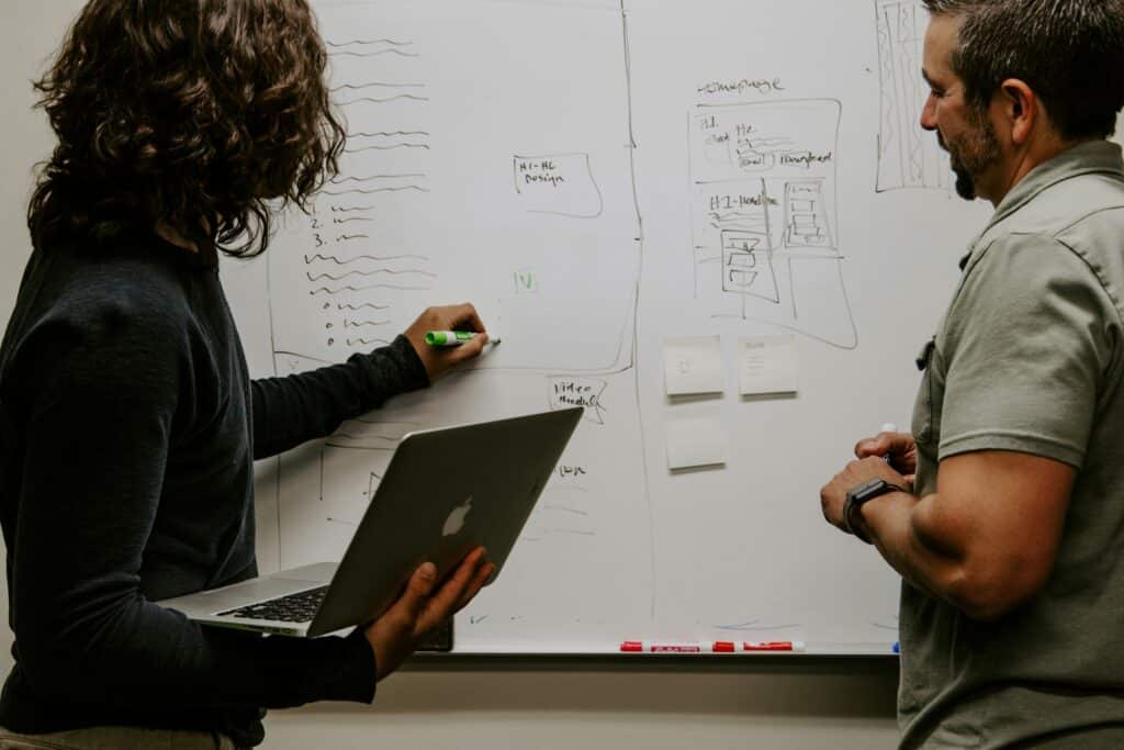 Professionals discussing data quality measurement strategies 